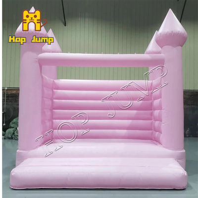 Resistente ULTRAVIOLETA de la despedida de la boda del rosa del PVC del castillo inflable de la casa 0.55m m el 13ft